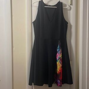 Woman’s dress. FASHION TO FIGURE. black with a pop of color. Used size 1